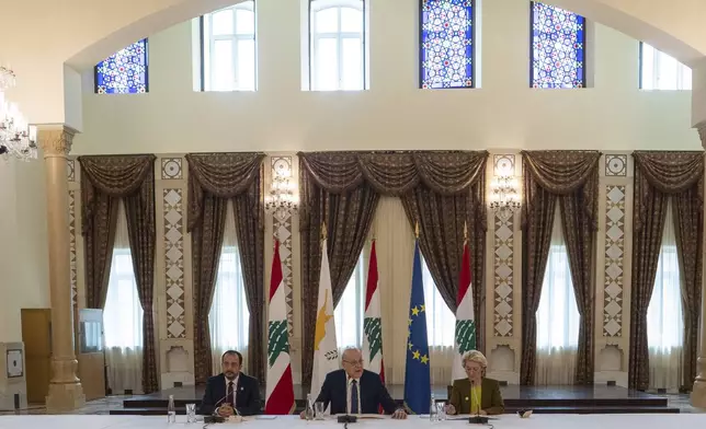 Lebanese caretaker Prime Minister Najib Mikati, center, speaks during his meeting with Cyprus' President Nikos Christodoulides, left, and President of the European Commission Ursula von der Leyen at the government palace in Beirut, Lebanon, Thursday, May 2, 2024. (AP Photo/Hassan Ammar)