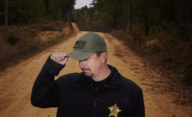 Worth County Sheriff's Lt. Adam Celinski stands for a portrait on Tuesday, Nov. 14, 2023, in Sylvester, Ga. As a sergeant with the Sylvester Police Department in 2016, Celinski responded to a 911 call of a paranoid man banging on the door of a woman’s home. The man, Terrell “Al” Clark, approached Celinski saying he was high and needed help. Celinski’s body-camera video showed he was calm and courteous as he handcuffed the man. Clark also was polite, but neighbors watched as he began to struggle and the officer got Clark facedown on some roadside grass, using a knee and hand to ensure he stayed there. (AP Photo/Brynn Anderson)