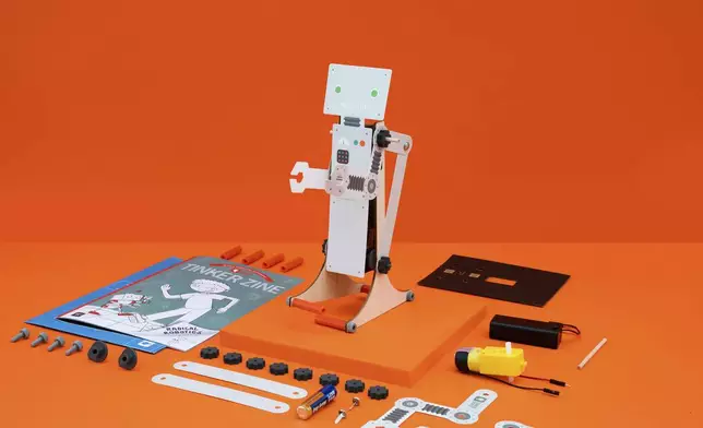 This product image released by KiwiCo shows components for a walking robot kit. (KiwiCo via AP)