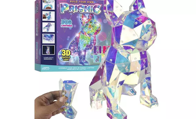 This product image released by Purple Ladybug shows a Prismic art kit in the shape of a dog . The 3D puzzle is geared toward crafters age 12 and up. (Purple Ladybug/The Toy Insider via AP)