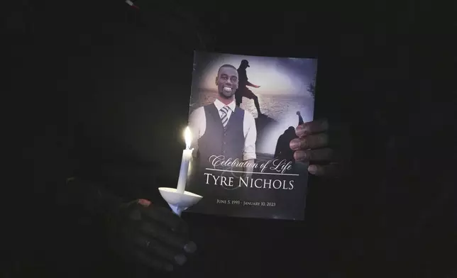 FILE - A crowd gathers to remember Tyre Nicholas during a candlelight vigil on the anniversary of his death Sunday, Jan. 7, 2024, in Memphis, Tenn. Nichols lost his life following a violent beating by five Memphis Police officers in January 2023. (AP Photo/Karen Pulfer Focht, File)