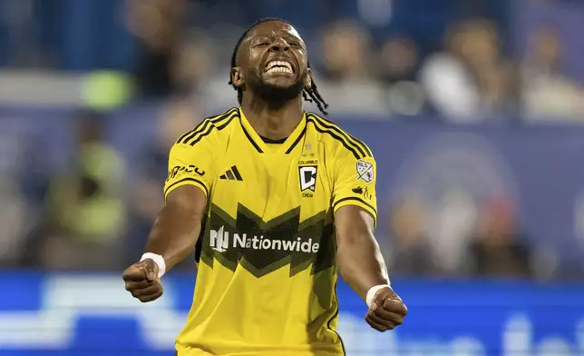 Columbus Crew defender Steven Moreira (31) celebrates a goal by teammate Diego Rossi (not shown) during the second half of an MLS soccer game against CF Montreal, Wednesday, May 15, 2024 in Montreal.(Christinne Muschi/The Canadian Press via AP)