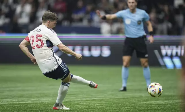 Vancouver Whitecaps' Ryan Gauld scores on a penalty kick against Inter Miami during the second half of an MLS soccer match Saturday, May 25, 2024, in Vancouver, British Columbia. (Darryl Dyck/The Canadian Press via AP)