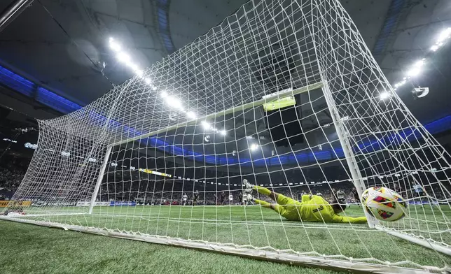 Inter Miami goalkeeper Drake Callender allows a goal to Vancouver Whitecaps' Ryan Gauld on a penalty shot during the second half of an MLS soccer match Saturday, May 25, 2024, in Vancouver, British Columbia. (Darryl Dyck/The Canadian Press via AP)