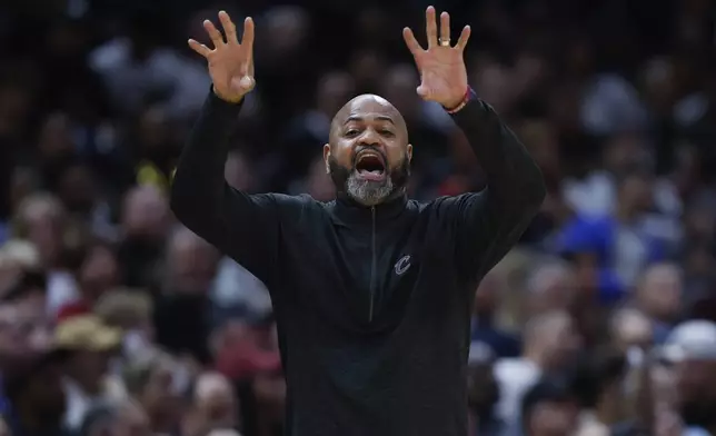 Cleveland Cavaliers head coach J.B. Bickerstaff calls a play against the Orlando Magic during the second half of Game 5 of an NBA basketball first-round playoff series, Tuesday, April 30, 2024, in Cleveland. (AP Photo/Ron Schwane)