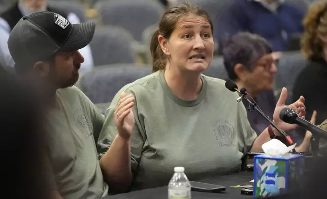 Nicole Herling, sister of shooter Robert Card, testifies Thursday, May 16, 2024, in Augusta, Maine, during a hearing of the independent commission investigating the law enforcement response to the mass shooting in Lewiston, Maine. (AP Photo/Robert F. Bukaty)