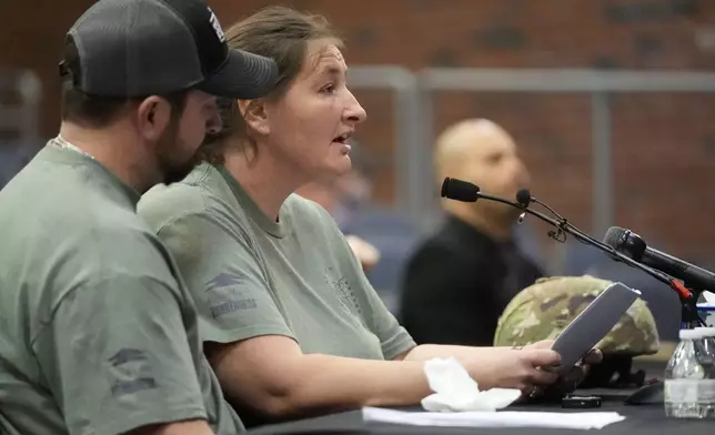 Nicole Herling, sister of shooter Robert Card, testifies, Thursday, May 16, 2024, in Augusta, Maine, during a hearing of the independent commission investigating the law enforcement response to the mass shooting in Lewiston, Maine. (AP Photo/Robert F. Bukaty)