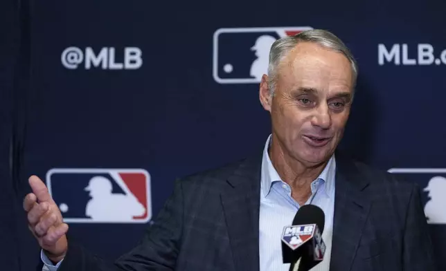 Major League Baseball Commissioner Rob Manfred speaks at a press conference following an owners meeting, Thursday, May 23, 2024, in New York. (AP Photo/Julia Nikhinson)