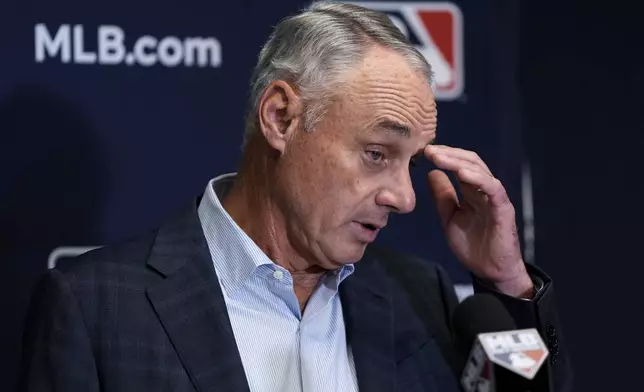 Major League Baseball Commissioner Rob Manfred speaks at a press conference following an owners meeting, Thursday, May 23, 2024, in New York. (AP Photo/Julia Nikhinson)