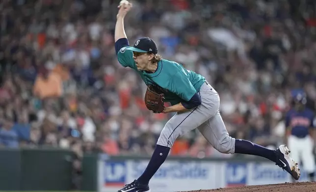 Seattle Mariners starting pitcher Logan Gilbert delivers during the first inning of a baseball game against the Houston Astro,s Saturday, May 4, 2024, in Houston. (AP Photo/Kevin M. Cox)