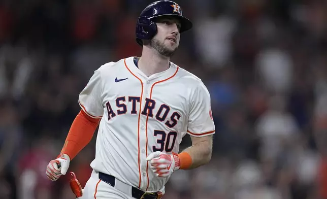 Houston Astros' Kyle Tucker runs the bases after hitting a two-run home run during the sixth inning of a baseball game against the Seattle Mariners, Sunday, May 5, 2024, in Houston. (AP Photo/Kevin M. Cox)