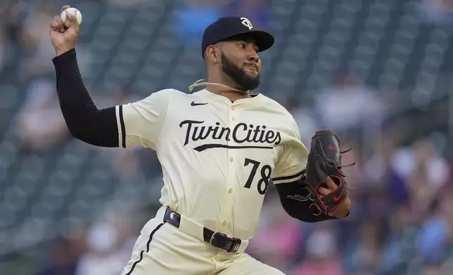 Minnesota Twins starting pitcher Simeon Woods Richardson delivers during the fourth inning of a baseball game against the Seattle Mariners, Monday, May 6, 2024, in Minneapolis. (AP Photo/Abbie Parr)