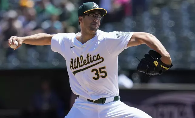 Oakland Athletics pitcher Joe Boyle throws to a Miami Marlins batter during the first inning of a baseball game Sunday, May 5, 2024, in Oakland, Calif. (AP Photo/Godofredo A. Vásquez)