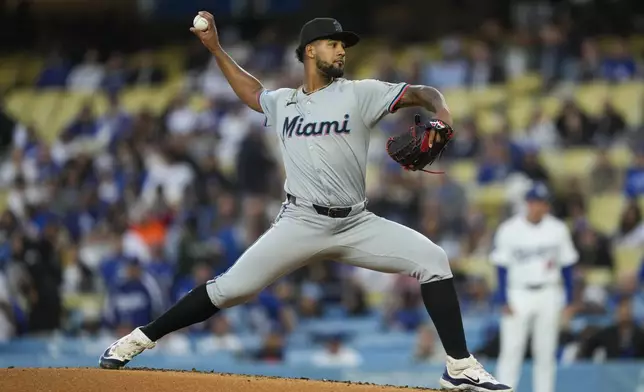 Miami Marlins starting pitcher Roddery Muñoz throws during the first inning of a baseball game against the Los Angeles Dodgers in Los Angeles, Monday, May 6, 2024. (AP Photo/Ashley Landis)
