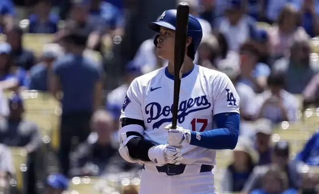 Los Angeles Dodgers designated hitter Shohei Ohtani steps up to bat during the first inning of a baseball game against the Miami Marlins Wednesday, May 8, 2024, in Los Angeles. (AP Photo/Mark J. Terrill)