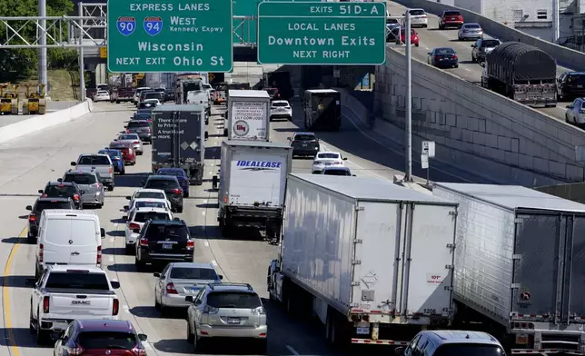 FILE - Motorists traveling on Interstates 90-94 head north of Chicago on Memorial Day, May 26, 2023. A record number of Americans are expected to hit the pavement over the 2024 Memorial Day holiday. (AP Photo/Charles Rex Arbogast)