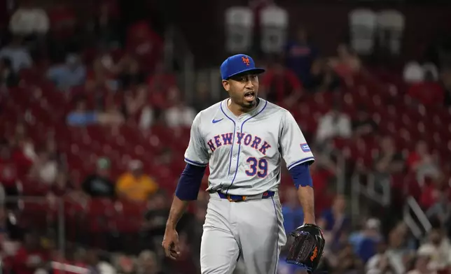 New York Mets relief pitcher Edwin Diaz celebrates after getting St. Louis Cardinals' Masyn Winn to ground out ending a baseball game Monday, May 6, 2024, in St. Louis. The Mets won 4-3. (AP Photo/Jeff Roberson)