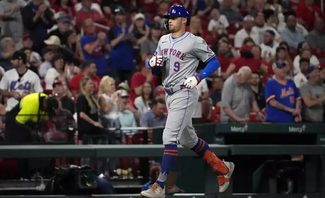 New York Mets' Brandon Nimmo rounds the bases after hitting a solo home run during the seventh inning of a baseball game against the St. Louis Cardinals Monday, May 6, 2024, in St. Louis. (AP Photo/Jeff Roberson)