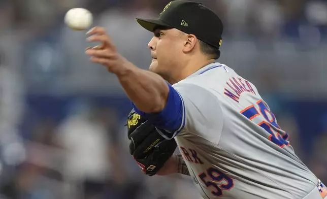 New York Mets' Sean Manaea delivers a pitch during the first inning of a baseball game against the Miami Marlins, Sunday, May 19, 2024, in Miami. (AP Photo/Wilfredo Lee)