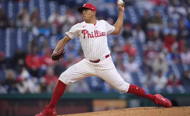 Philadelphia Phillies' Ranger Suarez pitches during the first inning of a baseball game against the New York Mets, Wednesday, May 15, 2024, in Philadelphia. (AP Photo/Matt Slocum)