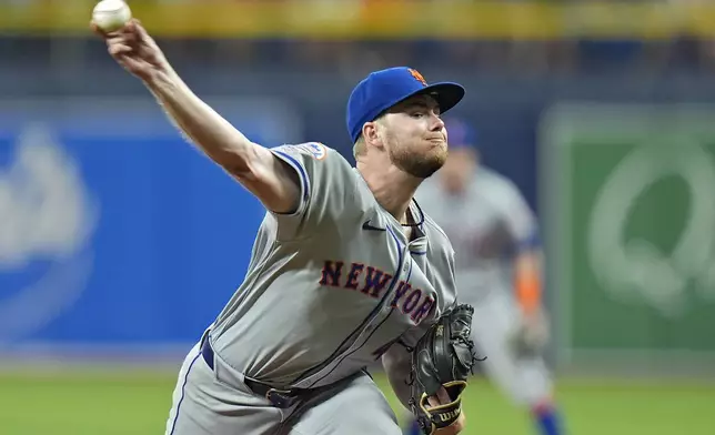 New York Mets pitcher Christian Scott delivers to the Tampa Bay Rays during the first inning of a baseball game Saturday, May 4, 2024, in St. Petersburg, Fla. (AP Photo/Chris O'Meara)
