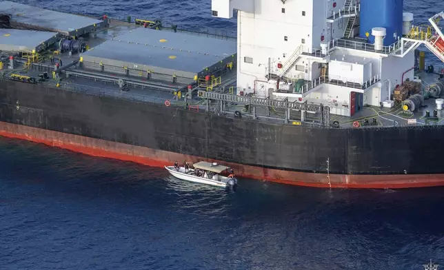 In this undated photo provided by the Etat Major des Armees on Thursday, May 30, 2024, a view of the Laax, a Greek-owned, Marshall Islands-flagged bulk carrier that came under attack by Yemen's Houthi rebels earlier this week, carrying cargo of grain bound for Iran, the group's main benefactor, authorities said Thursday. (Etat Major des Armees via AP)