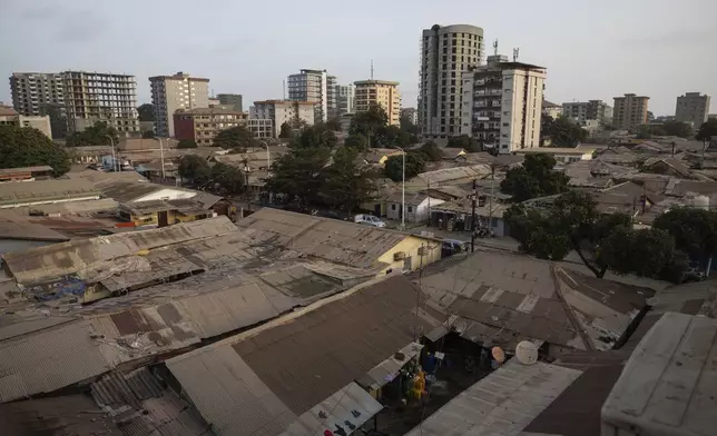 Buildings in Conakry, Guinea are seen on Wednesday, April 10, 2024. (AP Photo/Misper Apawu)