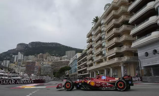 Ferrari driver Carlos Sainz of Spain steers his car during the first free practice ahead of the Formula One Monaco Grand Prix at the Monaco racetrack, in Monaco, Friday, May 24, 2024. (AP Photo/Luca Bruno)