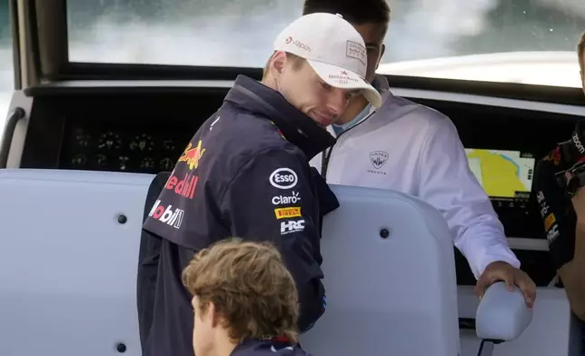 Red Bull driver Max Verstappen of the Netherlands arrives in the paddock ahead of the first free practice at the Monaco racetrack, in Monaco, Friday, May 24, 2024. The Formula one race will be held on Sunday. (AP Photo/Luca Bruno)