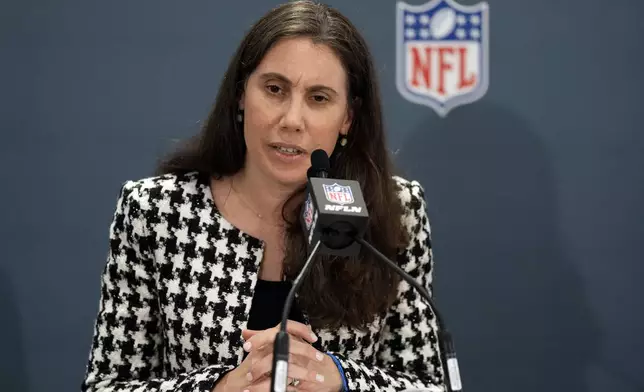 The NFL's senior vice president of social responsibility Anna Isaacson speaks during a news conference at the football league's owners spring meetings Tuesday, May 21, 2024, in Nashville, Tenn. (AP Photo/George Walker IV)