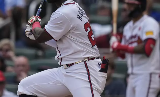 Atlanta Braves' Michael Harris II (23) hits a single in the fifth inning of a baseball game against the Washington Nationals, Monday, May 27, 2024, in Atlanta. (AP Photo/Mike Stewart)