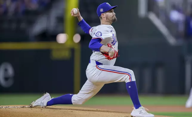 Texas Rangers starting pitcher Andrew Heaney delivers during the first inning of a baseball game against the Washington Nationals in Arlington, Texas, Wednesday, May 1, 2024. (AP Photo/Gareth Patterson)