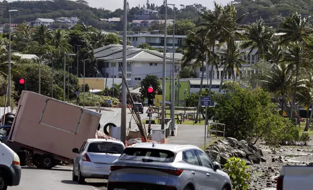 A blockade is pictured in Noumea, New Caledonia, Thursday May, 16, 2024. France has imposed a state of emergency in the French Pacific territory of New Caledonia. The measures imposed on Wednesday for at least 12 days boost security forces' powers to quell deadly unrest that has left four people dead, erupting after protests over voting reforms. (AP Photo/Cedric Jacquot)