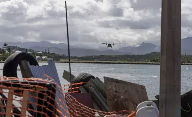 A French military plane arrives at Noumea-Magenta airport, New Caledonia, Thursday May, 16, 2024. France has imposed a state of emergency in the French Pacific territory of New Caledonia. The measures imposed on Wednesday for at least 12 days boost security forces' powers to quell deadly unrest that has left four people dead, erupting after protests over voting reforms. (AP Photo/Cedric Jacquot)