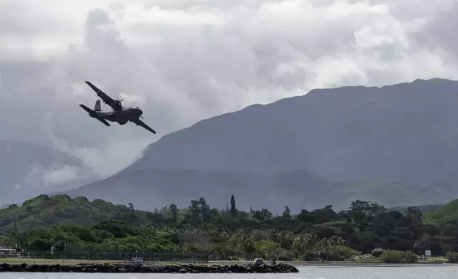 A French military plane arrives at Noumea-Magenta airport, New Caledonia, Thursday May, 16, 2024. France has imposed a state of emergency in the French Pacific territory of New Caledonia. The measures imposed on Wednesday for at least 12 days boost security forces' powers to quell deadly unrest that has left four people dead, erupting after protests over voting reforms. (AP Photo/Cedric Jacquot)