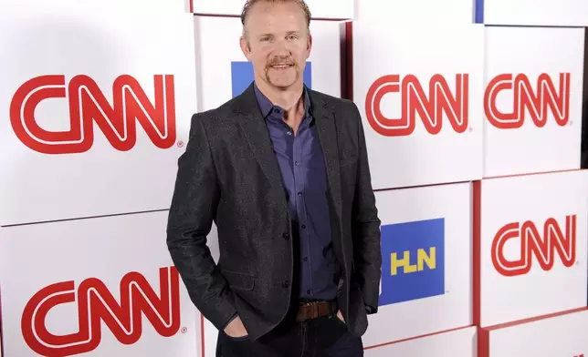 FILE - Morgan Spurlock of the CNN series "Inside Man" poses at the CNN Worldwide All-Star Party, on Friday, Jan. 10, 2014, in Pasadena, Calif. Spurlock, an Oscar-nominee who made food and American diets his life’s work, famously eating only at McDonald’s for a month to illustrate the dangers of a fast-food diet, has died. He was 53. (Photo by Chris Pizzello/Invision/AP, File)