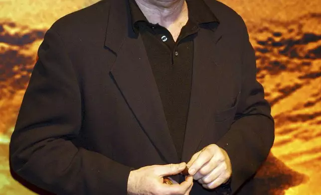 Actor Bernard Hill at the Tobacco Dock on Oct. 12 2001, in London, for the after show party of the world premiere of "Lord of the Rings: The Fellowship of the Ring." Hill, who delivered a rousing battle cry before leading his people into battle in “The Lord of the Rings: The Return of the King" and went down with the ship as captain in “Titanic,” has died. Hill, 79, died Sunday morning, May 5, 2024, agent Lou Coulson said. (William Conran/PA via AP)