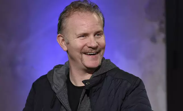 FILE - Filmmaker Morgan Spurlock participate in the BUILD Speaker Series to discuss the film, "Go North", at AOL Studios on Wednesday, Jan. 4, 2017, in New York. Spurlock, an Oscar-nominee who made food and American diets his life’s work, famously eating only at McDonald’s for a month to illustrate the dangers of a fast-food diet, has died. He was 53. (Photo by Evan Agostini/Invision/AP, File)