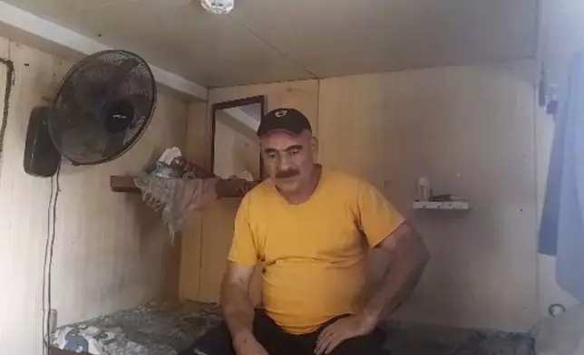 This image from video provided by Abdul Nasser Saleh shows him in his bedroom aboard the cargo ship Al-Maha at the seaport of Jeddah, Saudi Arabia, in January 2024. Saleh says he rarely got a good night’s sleep during the near-decade he spent working without pay on a cargo ship abandoned by its owner at ports along the Red Sea. (Courtesy Abdul Nasser Saleh via AP)