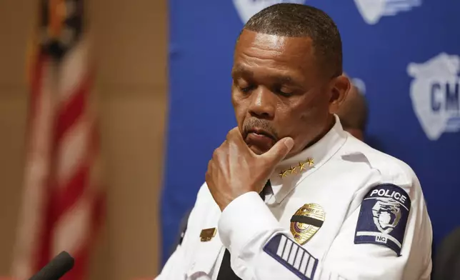 Charlotte-Mecklenburg Police Chief Johnny Jennings pauses at a press conference in Charlotte, N.C., Tuesday, April 30, 2024, regarding the shooting of four officers during an attempt to serve a warrant on April 29, 2024. (AP Photo/Nell Redmond)