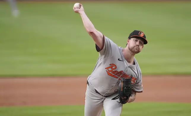 Baltimore Orioles pitcher Kyle Bradish throws to a Washington Nationals batter during the first inning of a baseball game at Nationals Park in Washington, Wednesday, May 8, 2024. (AP Photo/Susan Walsh)