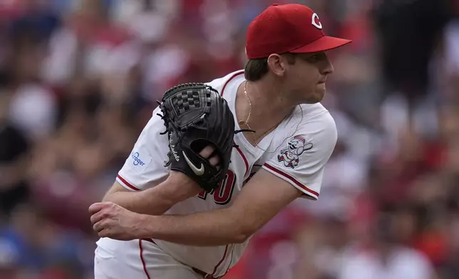 Cincinnati Reds starting pitcher Nick Lodolo follows through in the first inning of a baseball game against the Baltimore Orioles, Sunday, May 5, 2024, in Cincinnati. (AP Photo/Carolyn Kaster)