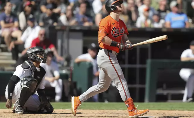 Baltimore Orioles Ryan O'Hearn watches the ball after hitting a two-run home run during the eighth inning of a baseball game against the Chicago White Sox Saturday, May 25, 2024, in Chicago. (AP Photo/Melissa Tamez)