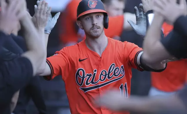 Baltimore Orioles Jordan Westburg celebrates after hitting a homer run during the eighth inning of a baseball game against the Chicago White Sox Saturday, May 25, 2024, in Chicago. (AP Photo/Melissa Tamez)