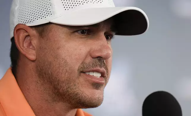 Brooks Koepka speaks during a news conference at the PGA Championship golf tournament at the Valhalla Golf Club, Wednesday, May 15, 2024, in Louisville, Ky. (AP Photo/Jeff Roberson)