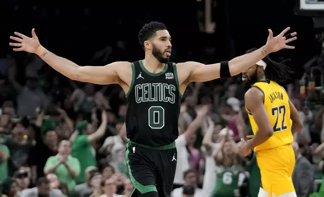 Boston Celtics forward Jayson Tatum reacts during the second half of Game 2 of the NBA Eastern Conference basketball finals against the Indiana Pacers, Thursday, May 23, 2024, in Boston. (AP Photo/Steven Senne)