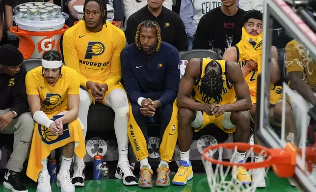 Members of the Indiana Pacers watch from the bench during the second half of Game 2 of the NBA Eastern Conference basketball finals against the Boston Celtics, Thursday, May 23, 2024, in Boston. (AP Photo/Michael Dwyer)