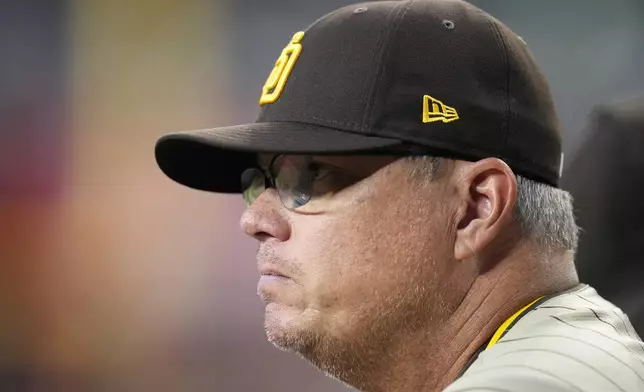 San Diego Padres manager Mike Shildt watches the action on the field during the second inning of a baseball game against the Arizona Diamondbacks Friday, May 3, 2024, in Phoenix. (AP Photo/Ross D. Franklin)