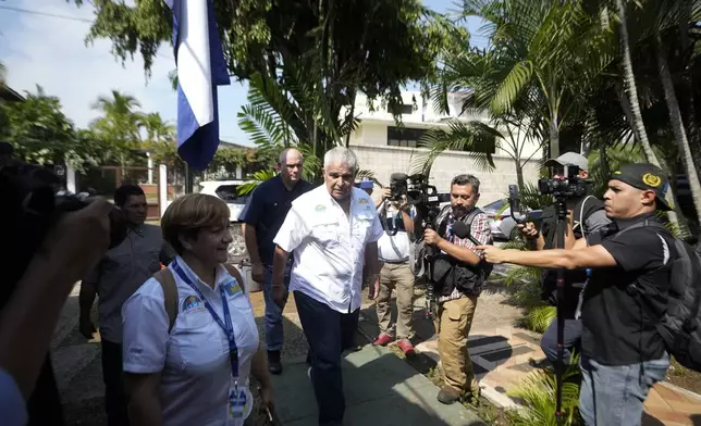 Achieving Goals presidential candidate Jose Raul Mulino arrives to Nicaraguan Embassy after voting during a general election in Panama City, Sunday, May 5, 2024. (AP Photo/Matias Delacroix)