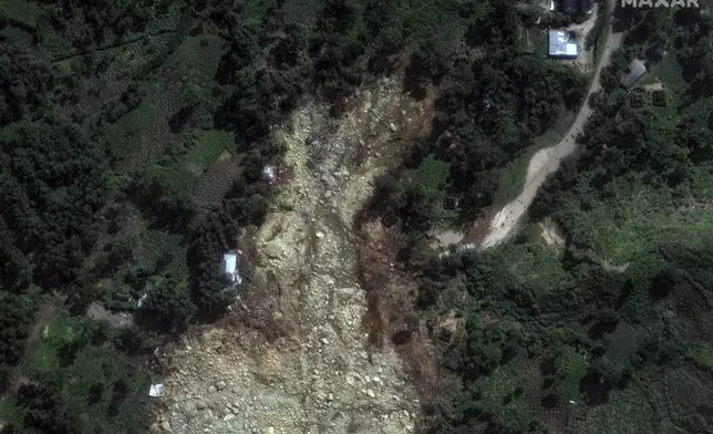 This May 27, 2024, satellite image provided by Maxar Technologies shows the recent landslide in the Enga region of northern Papua New Guinea that killed hundreds of people and buried part of the Yambali village. (Maxar Technologies via AP)